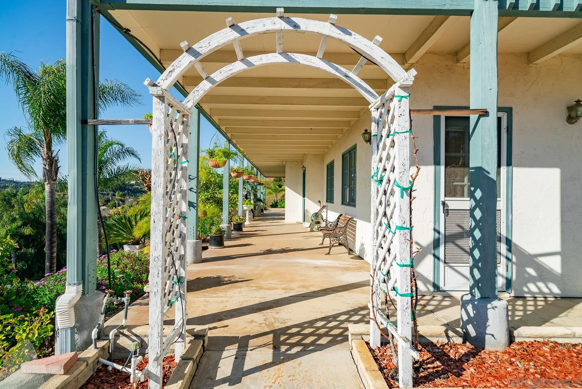 2908 Lakemont Drive Fallbrook, CA 92028 - Photo 56 of 70 a view of a house with a porch and furniture