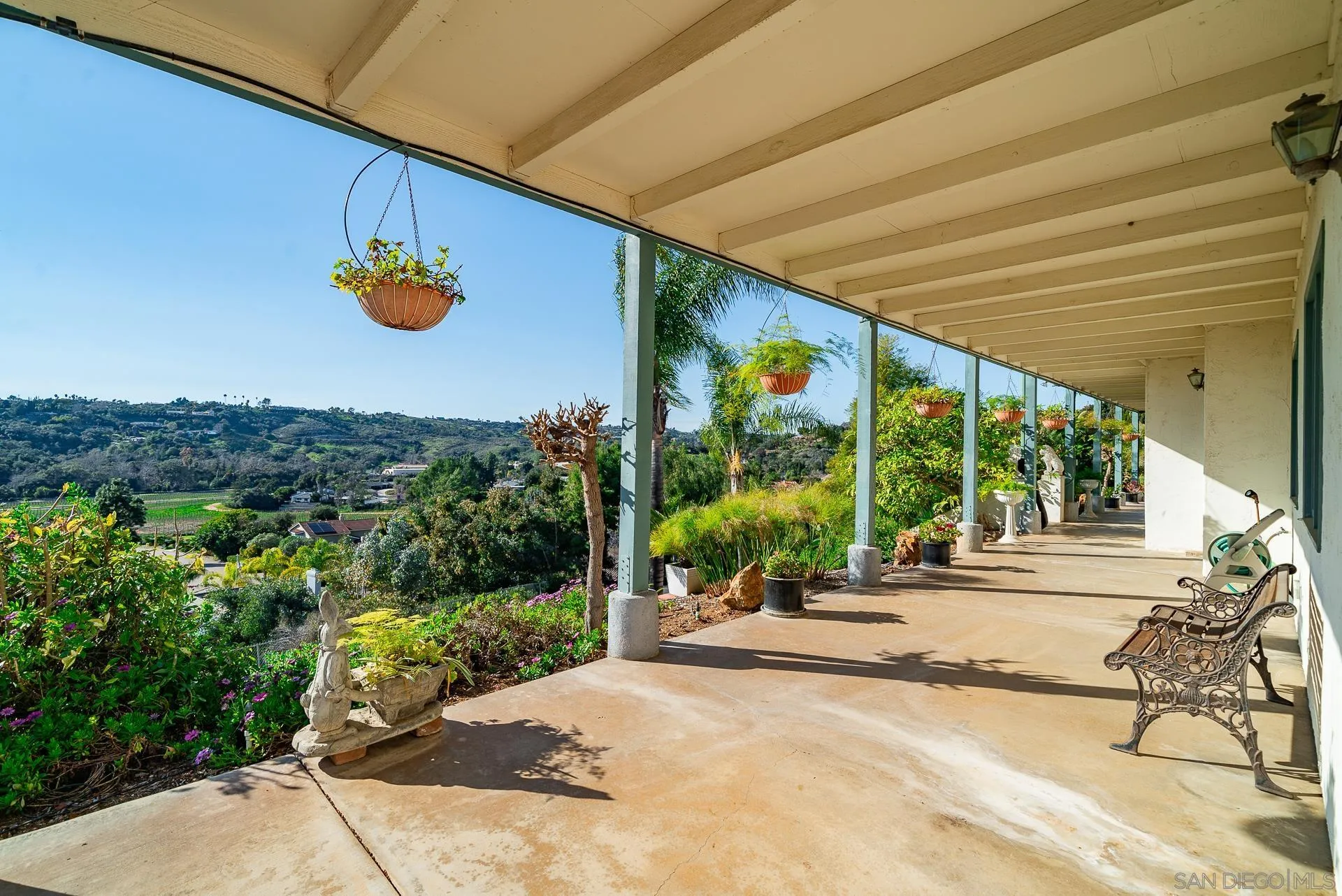 2908 Lakemont Drive Fallbrook, CA 92028 - Photo 57 of 70 a view of a patio with a table and chairs