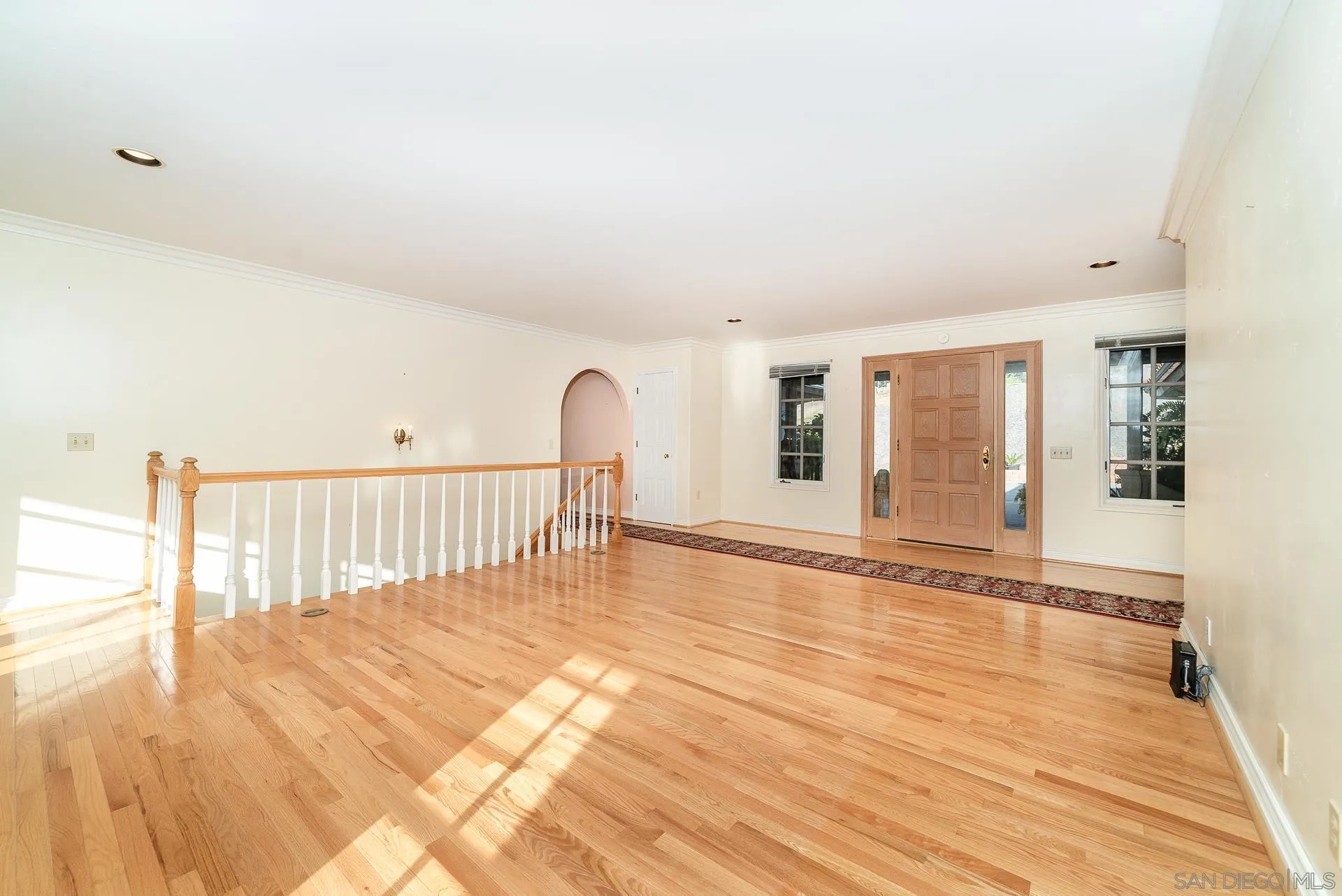 2908 Lakemont Drive Fallbrook, CA 92028 - Photo 6 of 70 a view of an empty room with wooden floor and a window