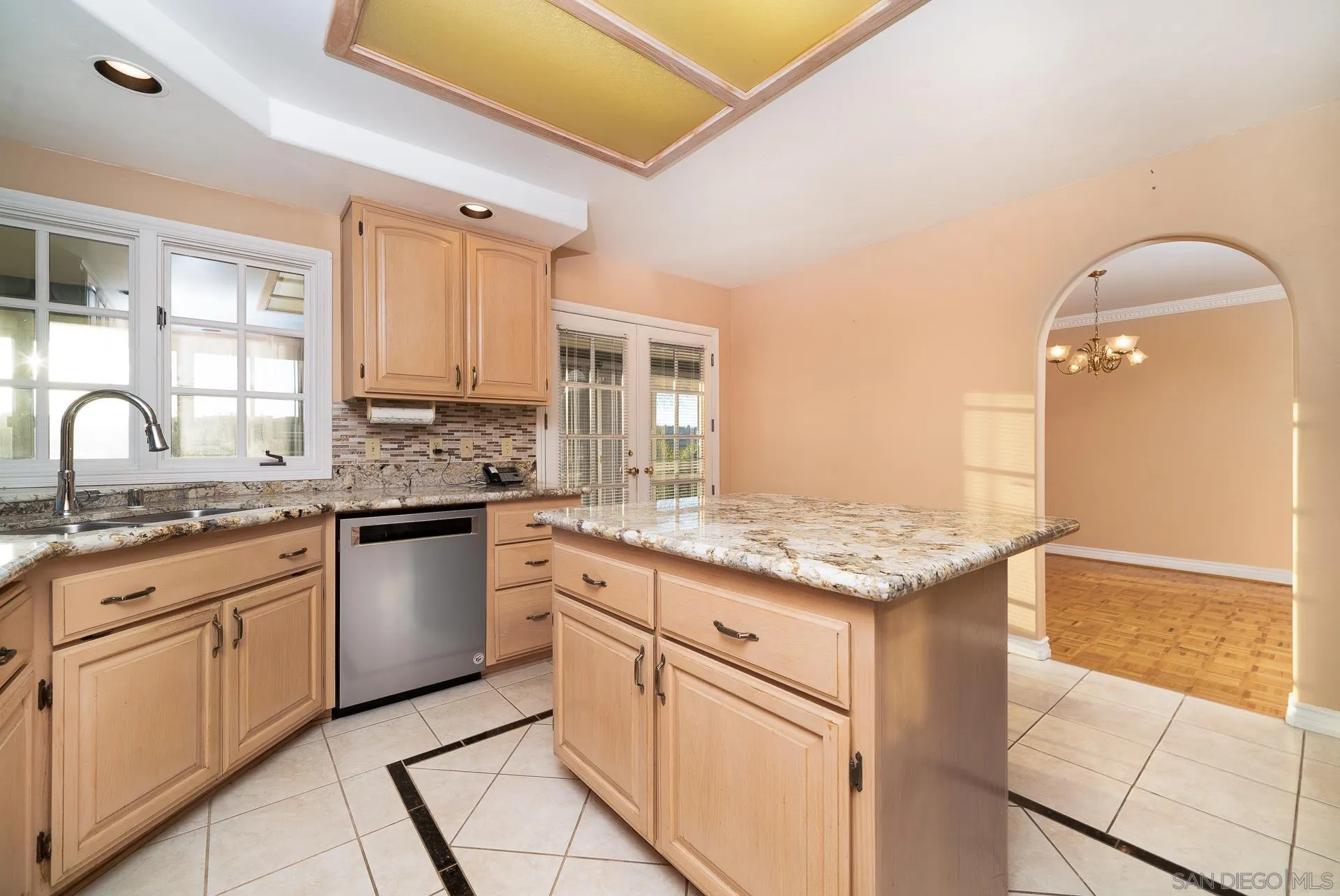 2908 Lakemont Drive Fallbrook, CA 92028 - Photo 9 of 70 a kitchen with granite countertop a sink stove and cabinets