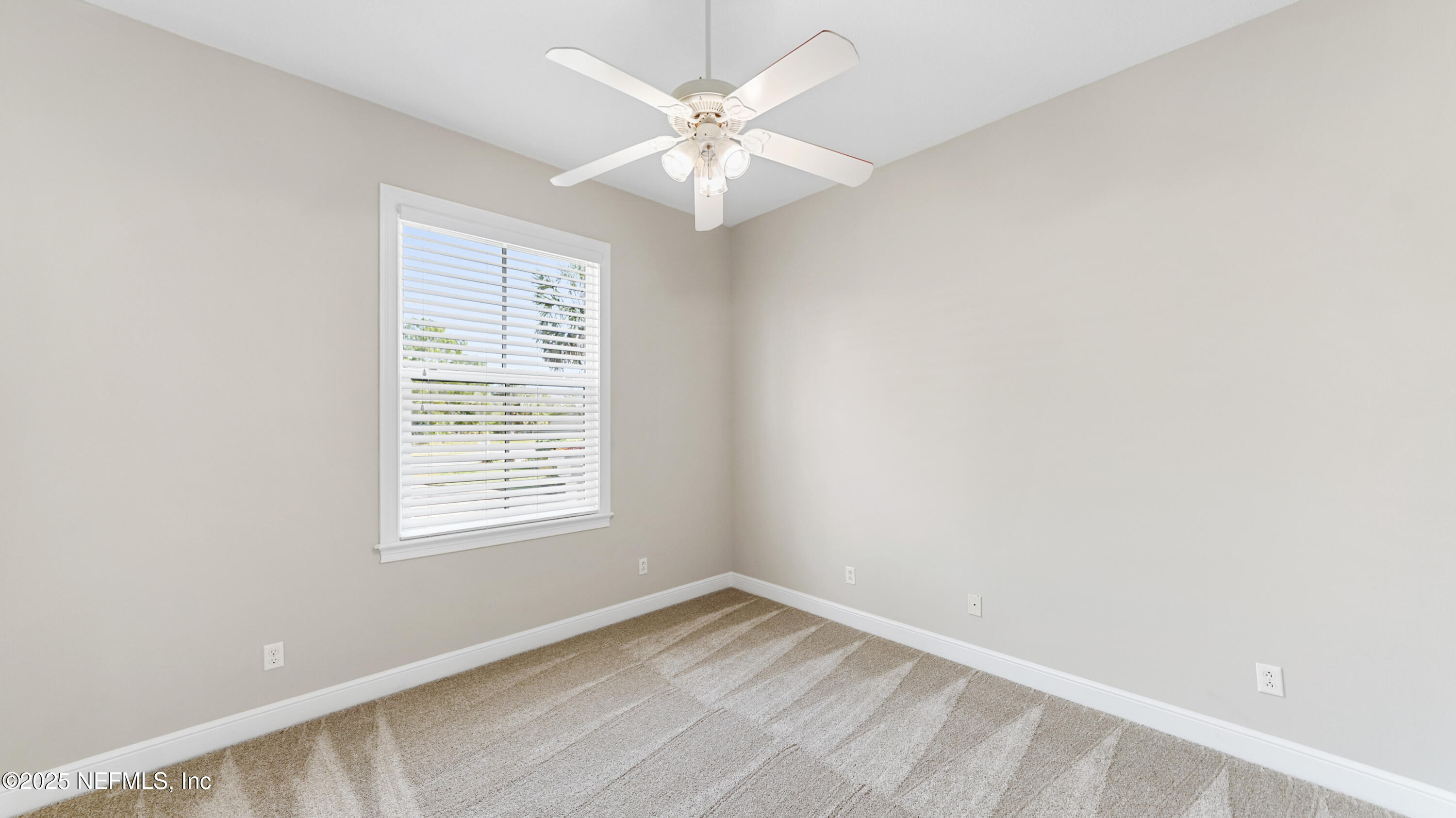 108 Spoonbill Point Court St. Augustine, FL 32080 - Photo 24 of 57 an empty room with a window and a fan