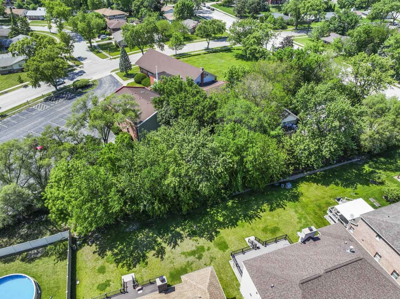 309 Landmeier Road Elk Grove Village, IL 60007 - Photo 14 of 15 a view of a garden with a lake view