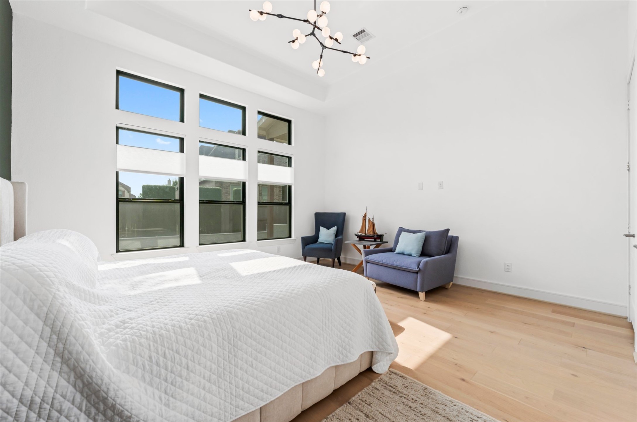 1053 Bat Hawk Court Conroe, TX 77385 - Photo 27 of 50 a bedroom with a bed and a large window