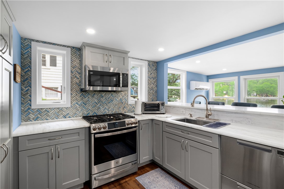 26 Acres Of Pine Road Coventry, RI 02816 - Photo 20 of 36 Custom cabinetry, leathered granite counters & stainless appliances