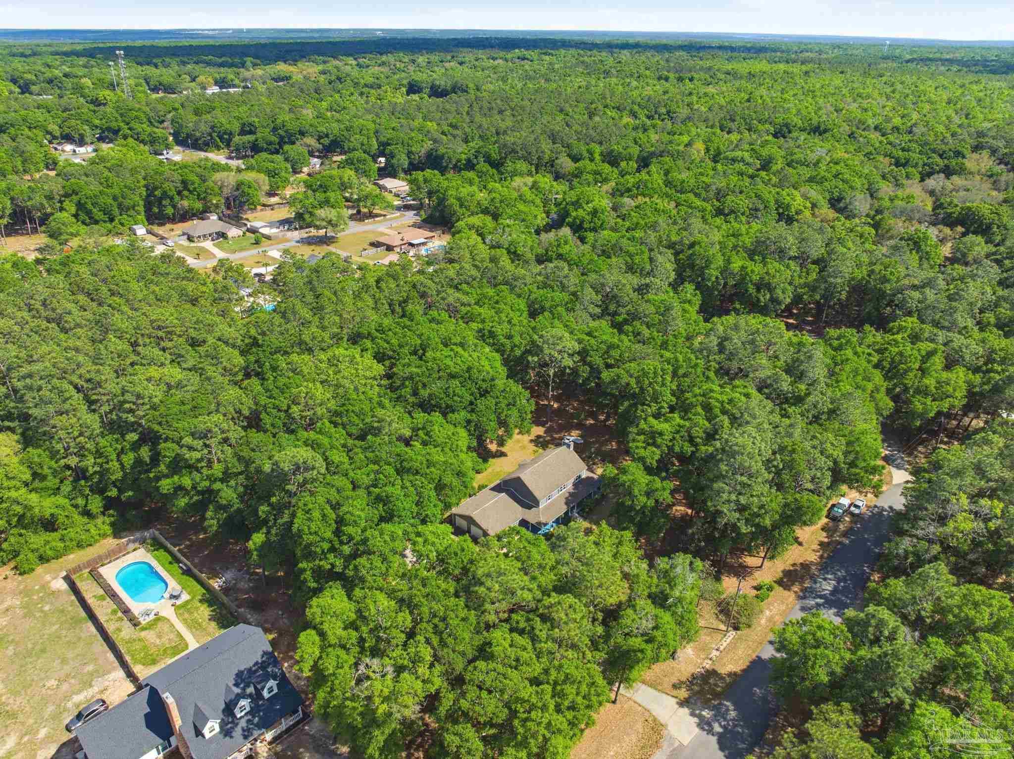 6930 Summit Way Milton, FL 32570 - Photo 61 of 71 an aerial view of a house with a yard