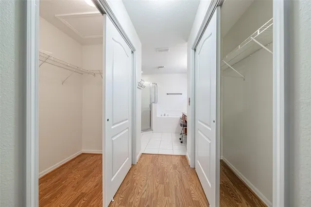 a view of a bathroom from a hallway