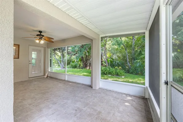 a view of a room with a large window