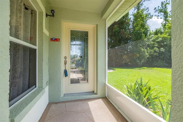 a view of porch with a large window