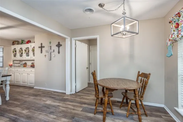 a utility room with sink dryer and washer