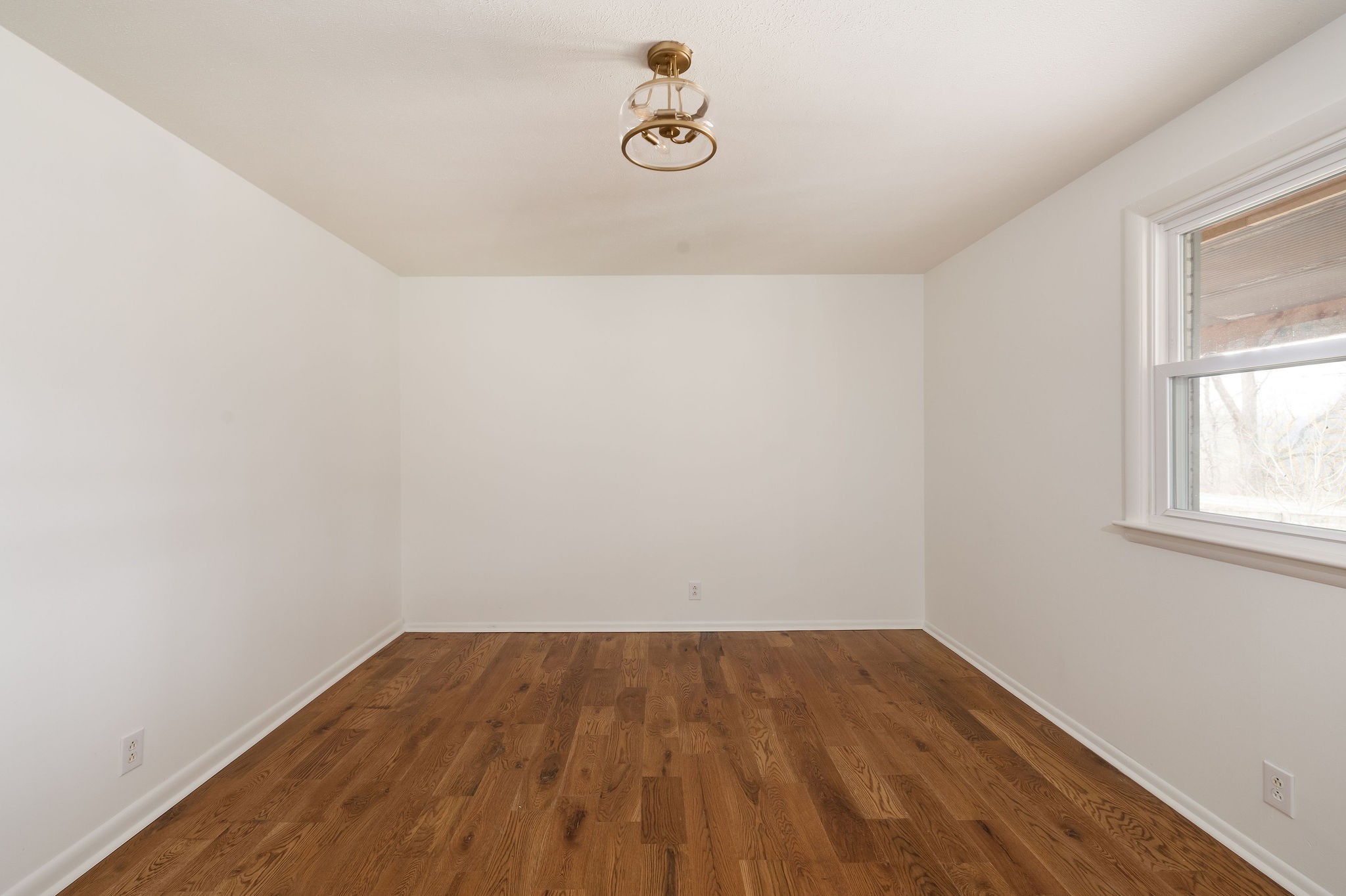 1826 New Hope Road Joelton, TN 37080 - Photo 40 of 95 a view of a room with wooden floor and windows