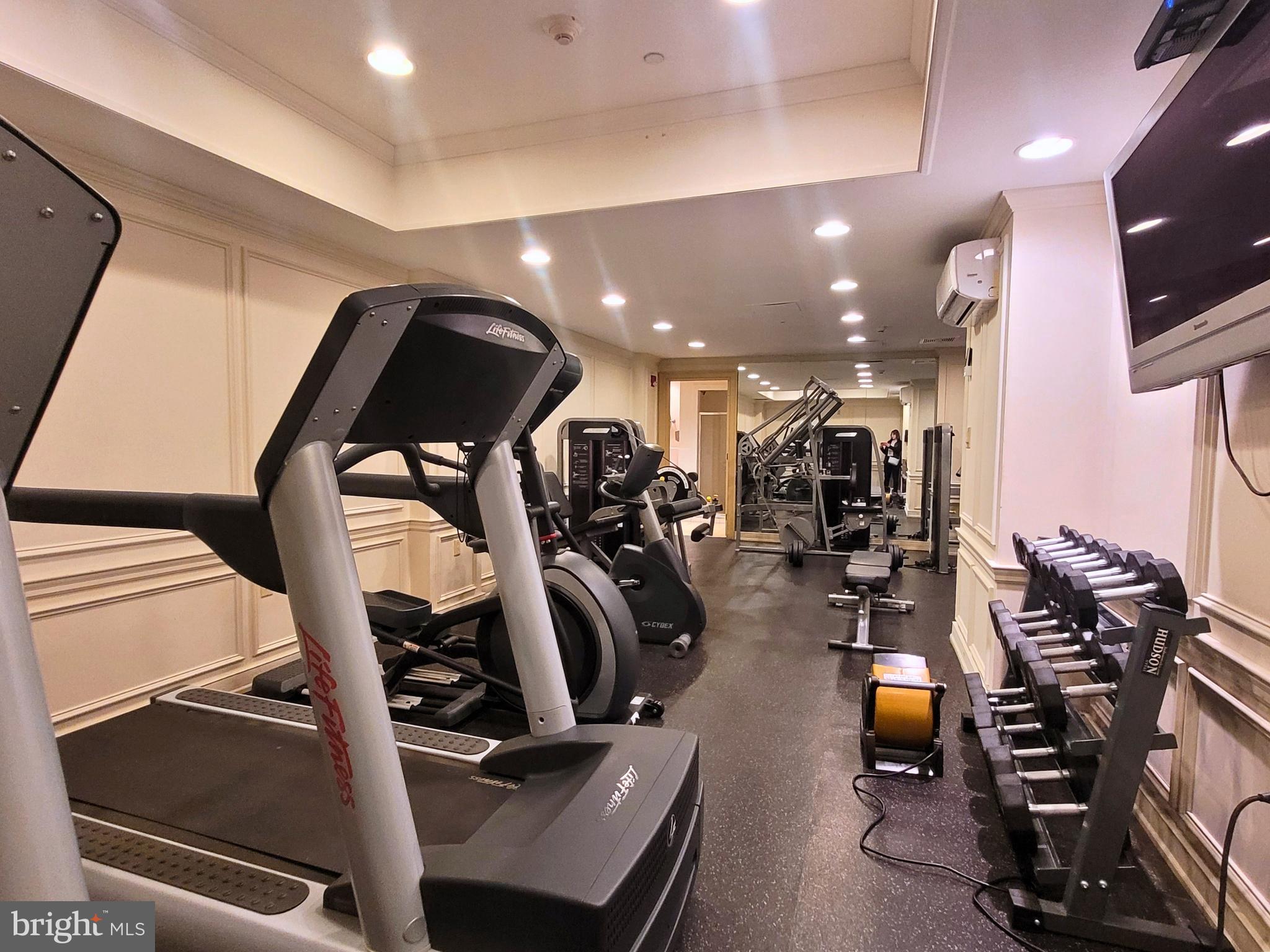 2031 Locust Street, Unit 1402 Philadelphia, PA 19103 - Photo 11 of 15 a view of a room with gym equipment