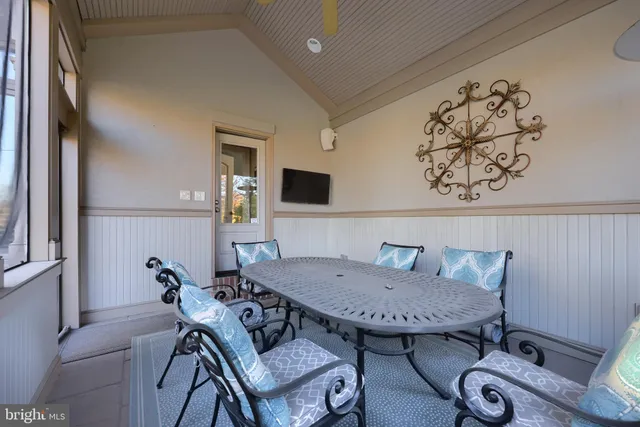 a bedroom with a bed and a fireplace