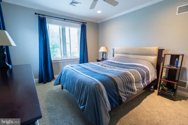 a kitchen with granite countertop a sink and cabinets