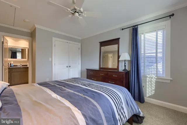 a room with pool table and furniture