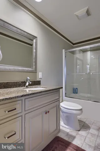 a view of house with a yard and potted plants