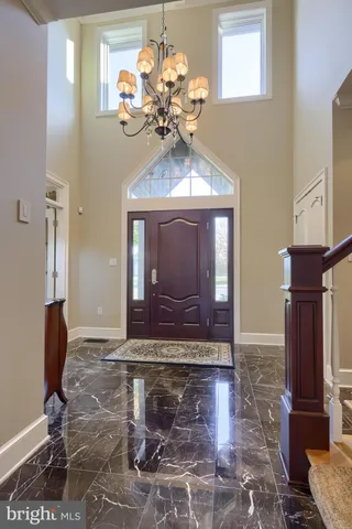 a work room with furniture and a potted plant
