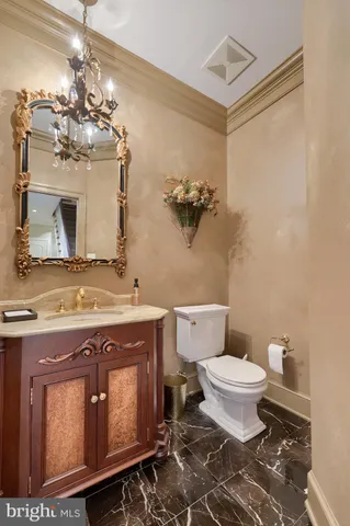 a living room with furniture a fireplace and a large window