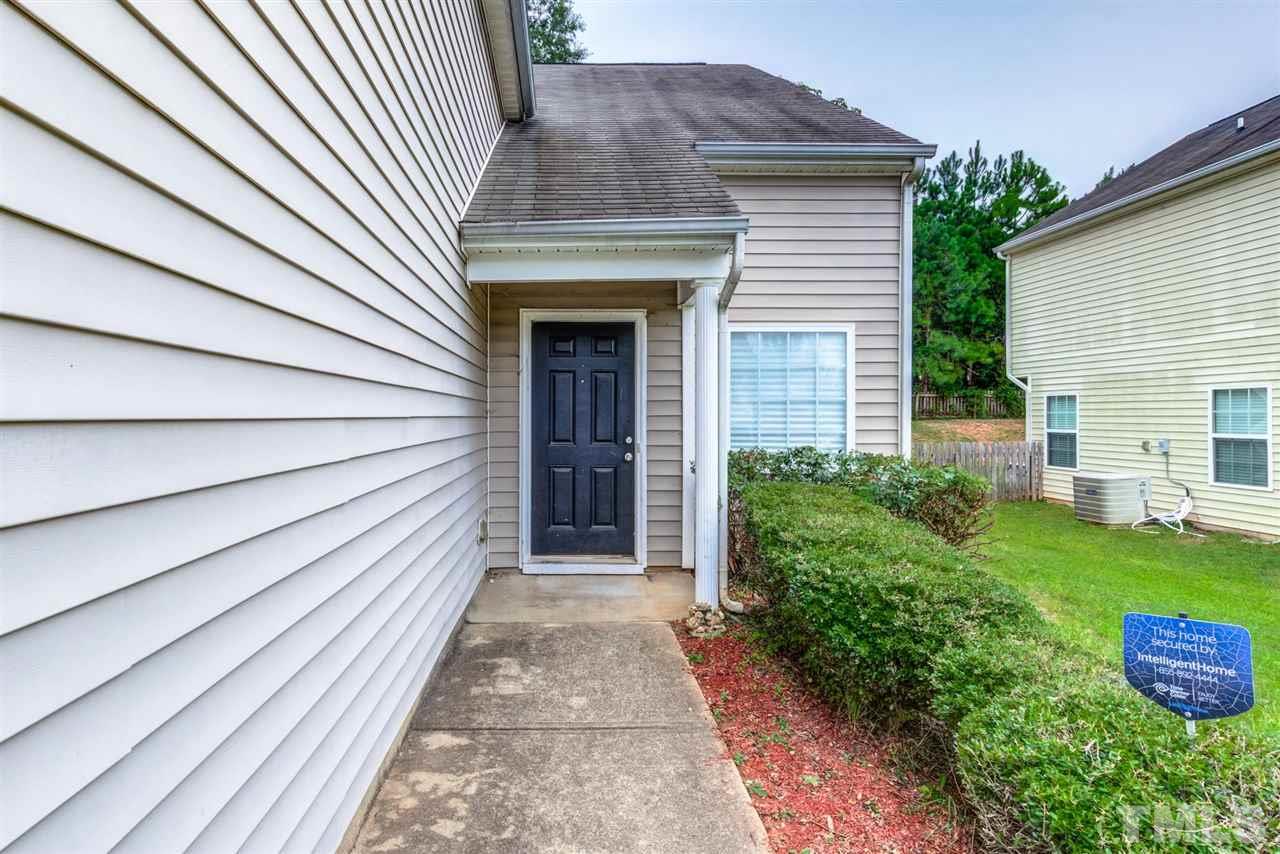 3713 Cyrus Street Raleigh, NC 27610 - Photo 5 of 30 Sidewalk to the covered front door