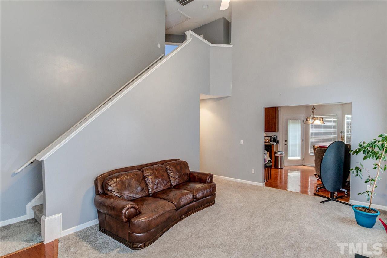 3713 Cyrus Street Raleigh, NC 27610 - Photo 9 of 30 Open Family room - view of stairs to second floor