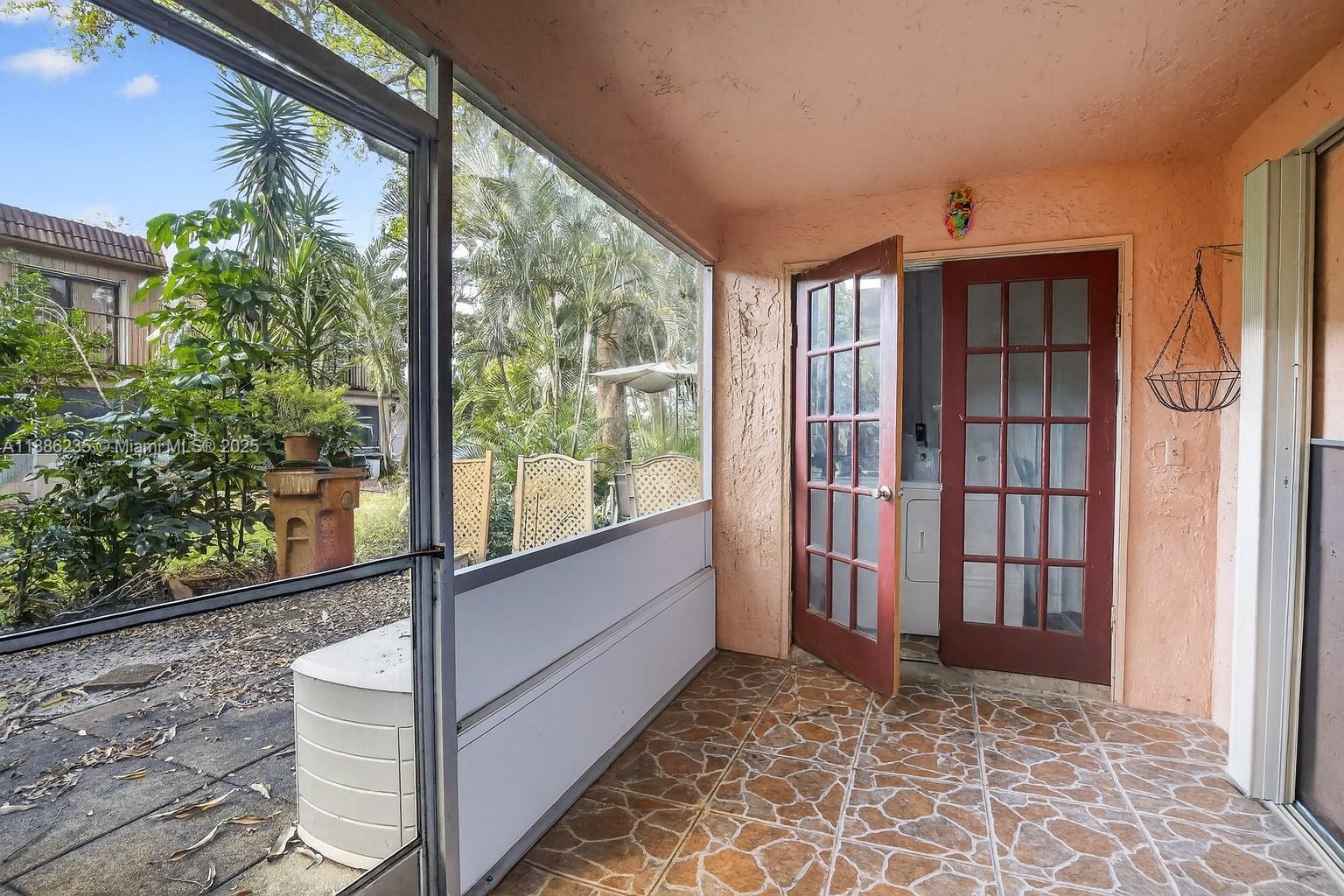 27 Madrid Lane, Unit 28 Davie, FL 33324 - Photo 20 of 34 a view of front door