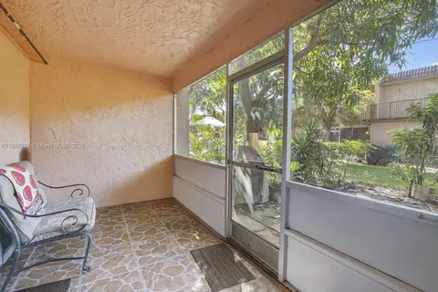 a view of a room with a large window