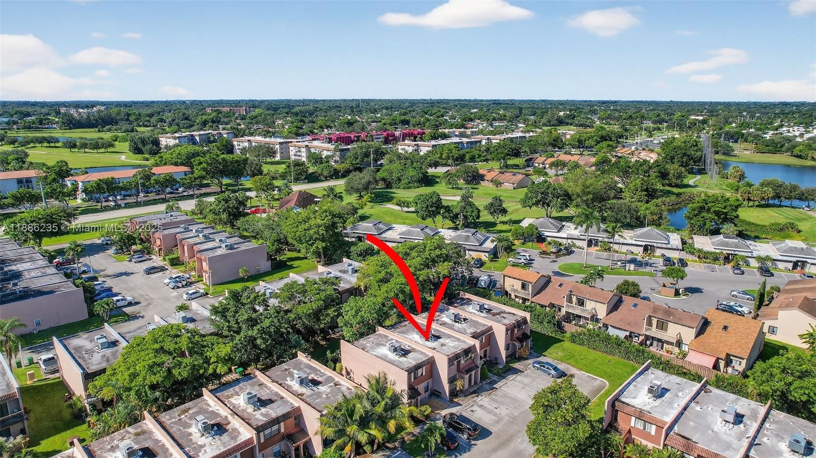 27 Madrid Lane, Unit 28 Davie, FL 33324 - Photo 34 of 34 an aerial view of a city with lots of residential buildings