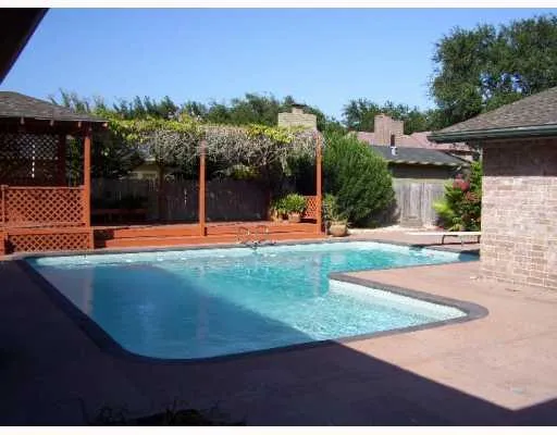 a view of a playground with a patio