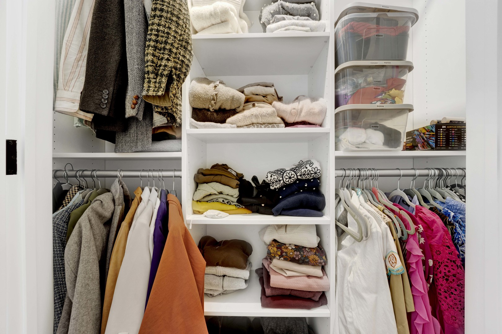 234 West Polk Street, Unit 2903 Chicago, IL 60607 - Photo 24 of 39 a view of walk in closet with clothes and shoes