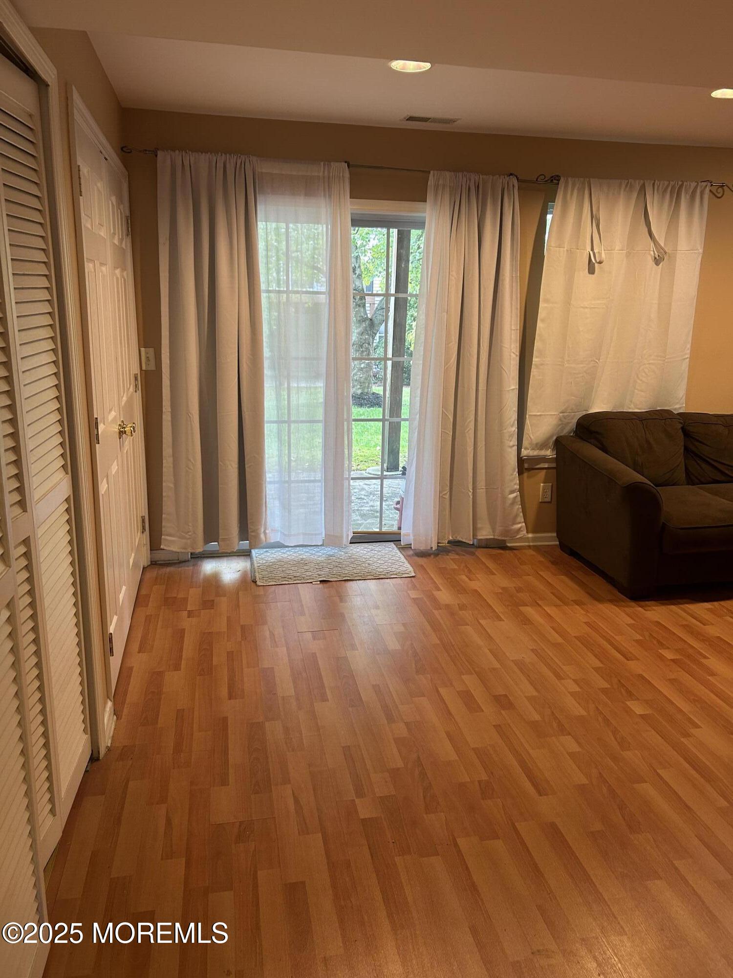 319 Bernard Drive Morganville, NJ 07751 - Photo 28 of 32 a view of an empty room with a window