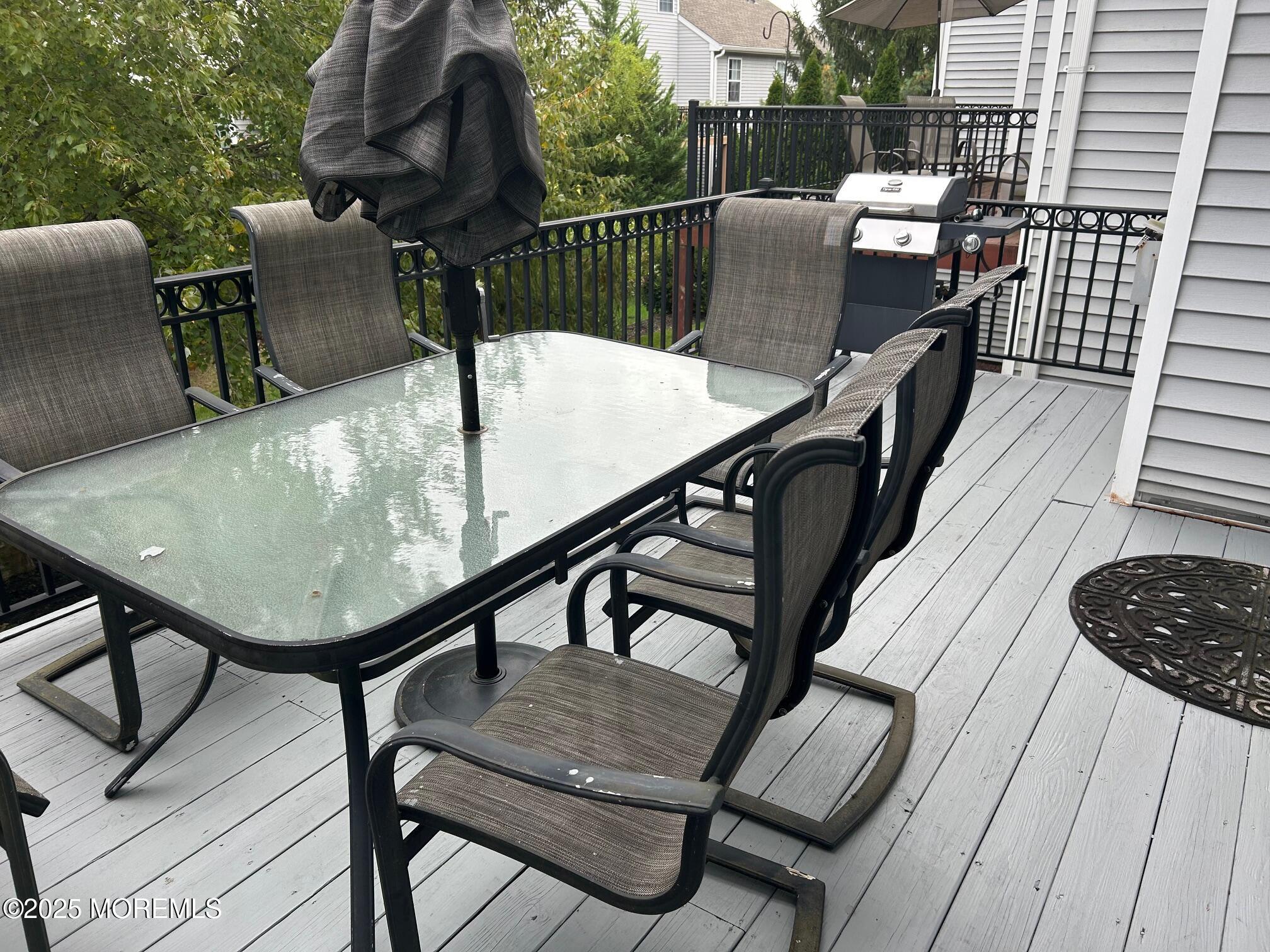 319 Bernard Drive Morganville, NJ 07751 - Photo 10 of 32 a balcony view with couple of chairs
