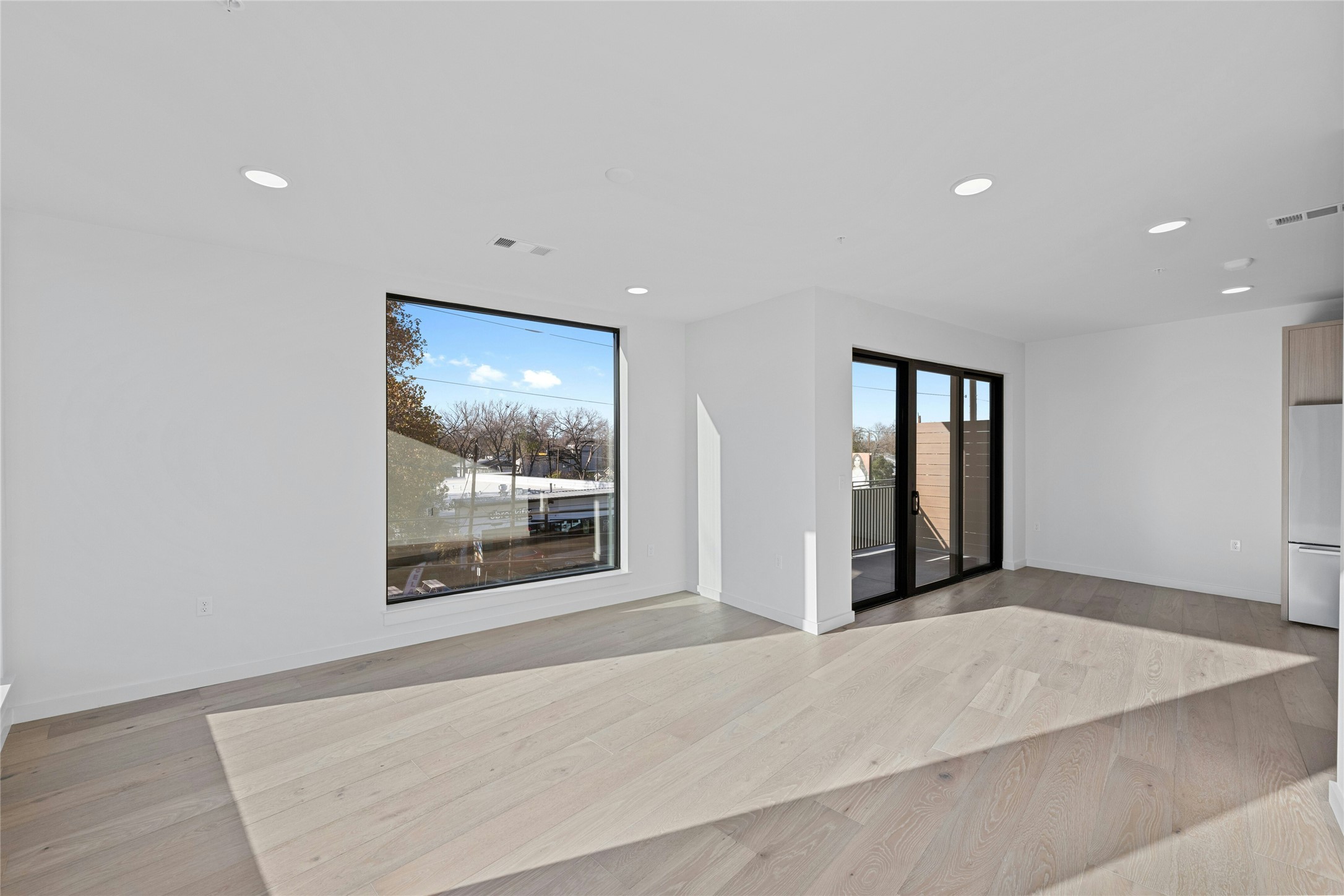 2209 South 1st Street, Unit 321 Austin, TX 78704 - Photo 13 of 40 Unfurnished room with recessed lighting and light wood finished floors