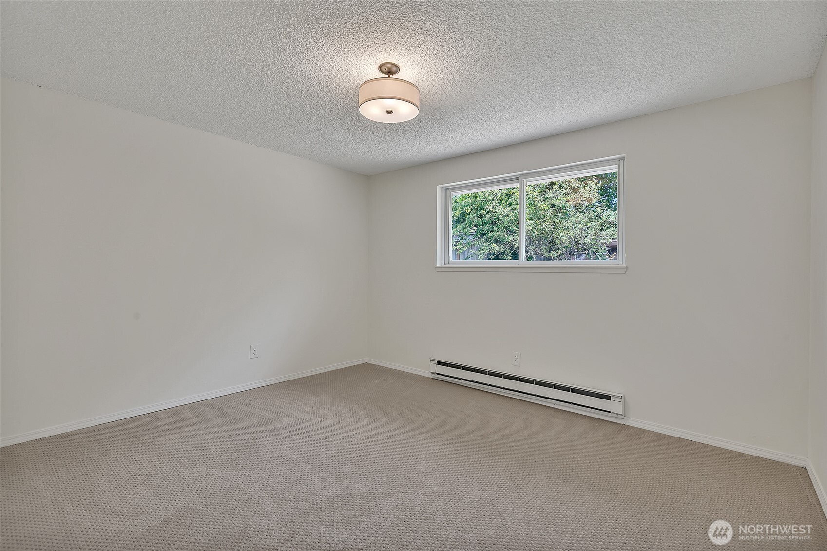 46 Ira Light Street Steilacoom, WA 98388 - Photo 17 of 35 an empty room with a window