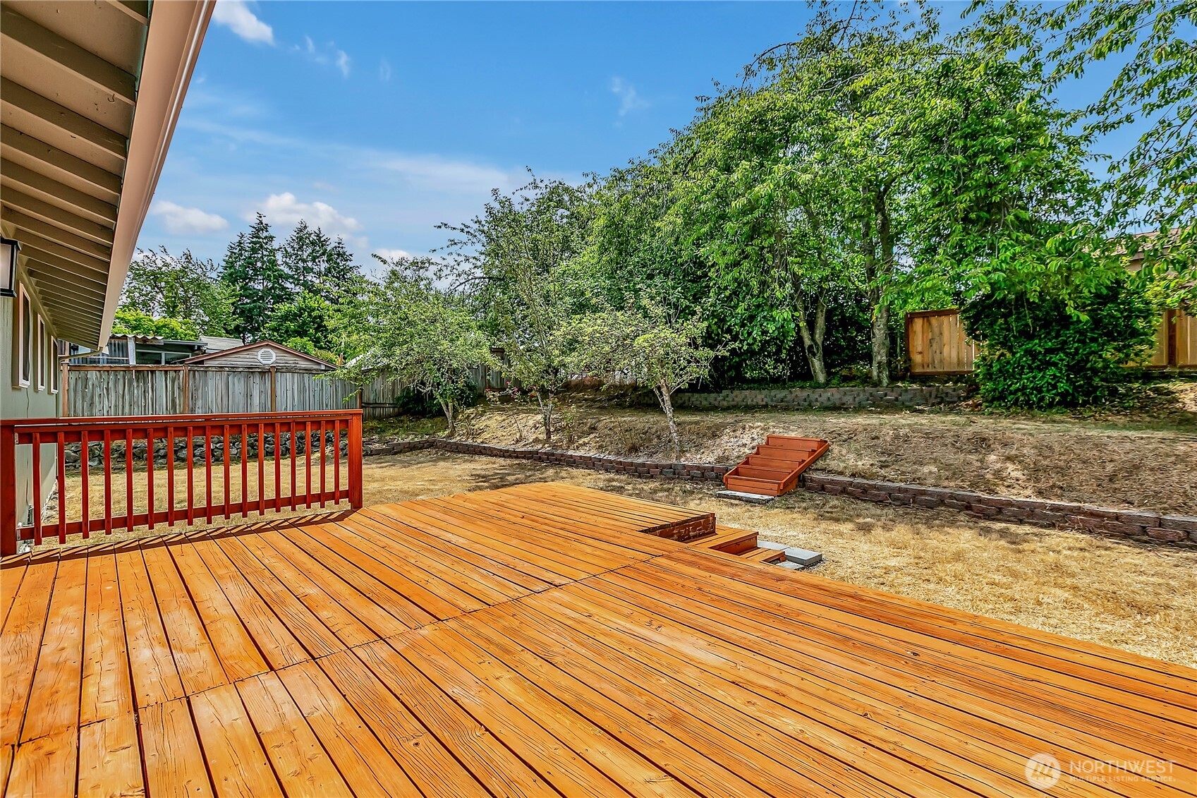 46 Ira Light Street Steilacoom, WA 98388 - Photo 27 of 35 a tennis court with view of trees in the background