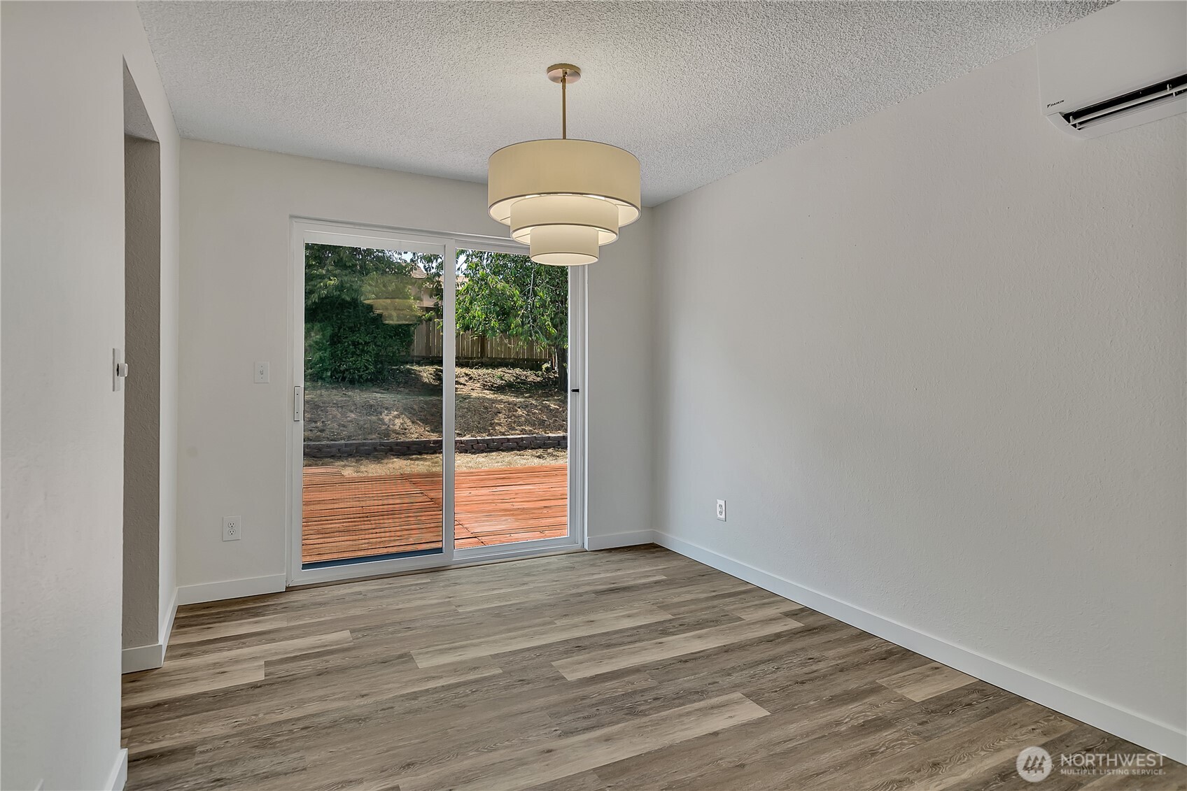 46 Ira Light Street Steilacoom, WA 98388 - Photo 10 of 35 a view of a room with wooden floor and iron gate