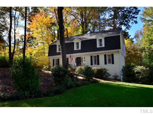 7201 Grist Mill Road Raleigh, NC 27615 - Photo 1 of 25 a front view of a house with a yard