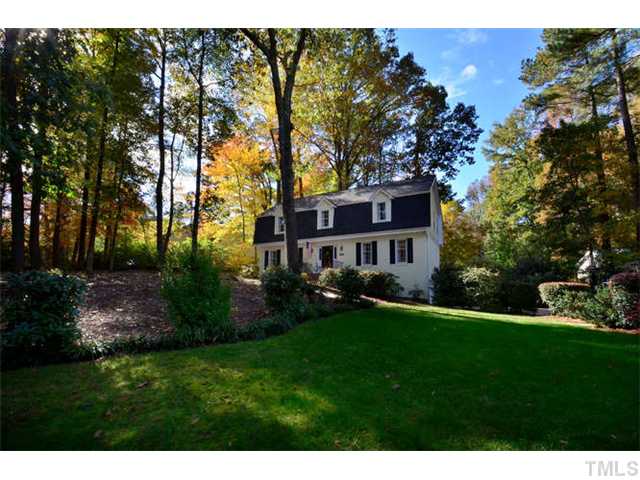 7201 Grist Mill Road Raleigh, NC 27615 - Photo 25 of 25 a view of a house with a yard