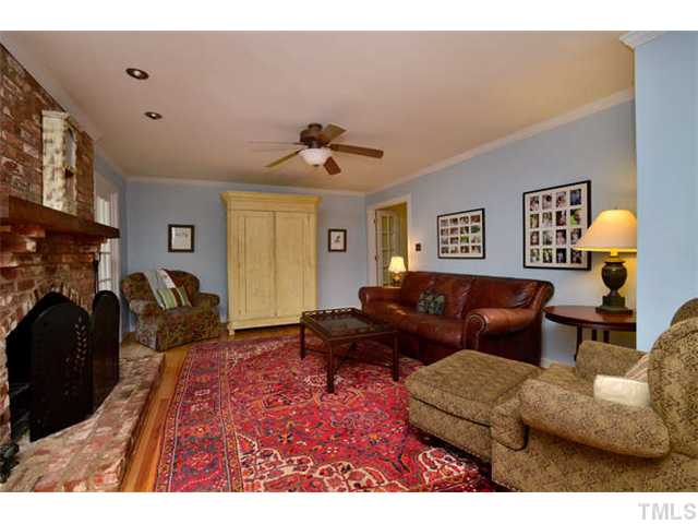 7201 Grist Mill Road Raleigh, NC 27615 - Photo 6 of 25 a living room with furniture a couch and a window