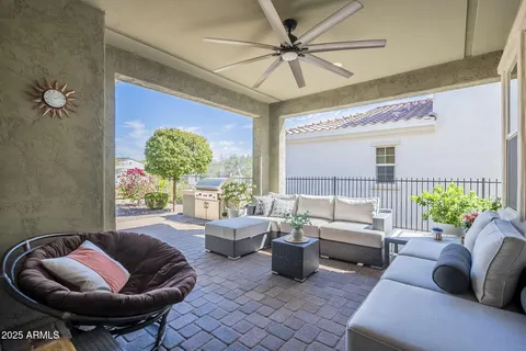 a living room with furniture a window and a table