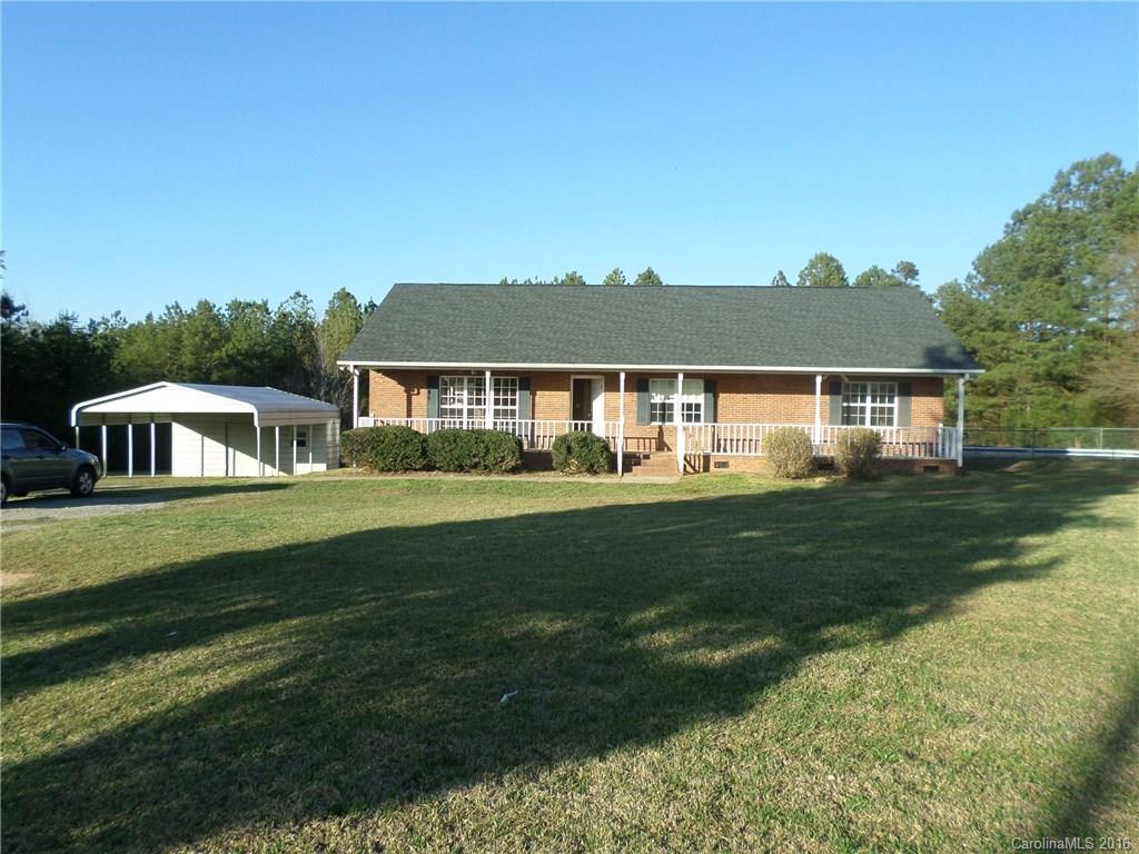 2680 Cassel's Road Chester, SC 29706 - Photo 1 of 22 a front view of a house with a garden