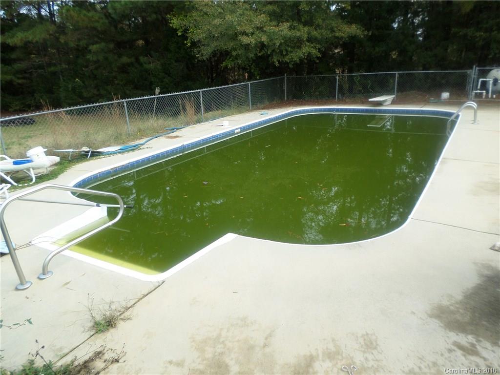 2680 Cassel's Road Chester, SC 29706 - Photo 22 of 22 a view of a swimming pool with a yard and sitting space