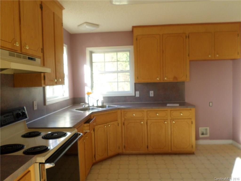 2680 Cassel's Road Chester, SC 29706 - Photo 5 of 22 a kitchen with a sink a stove and cabinets