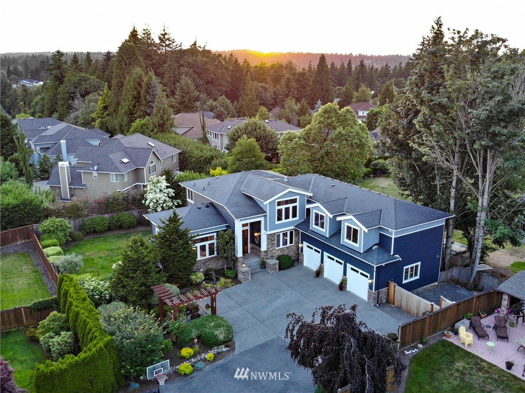 an aerial view of a house with a garden