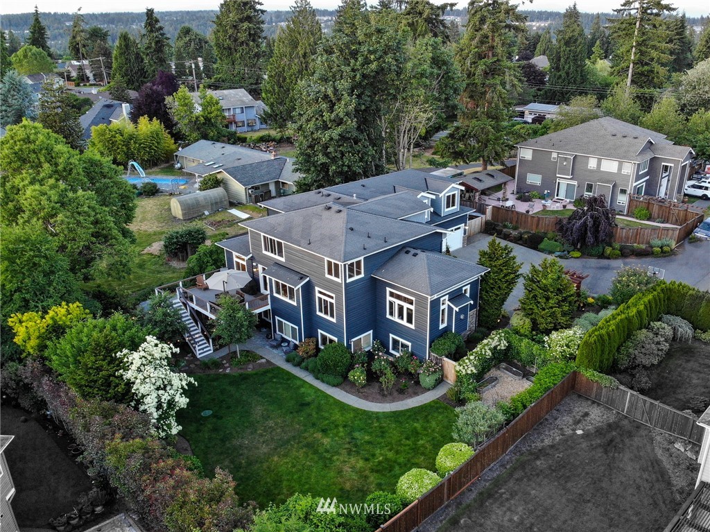 24210 23rd Avenue Southeast Bothell, WA 98021 - Photo 2 of 7 an aerial view of a house with garden space and street view