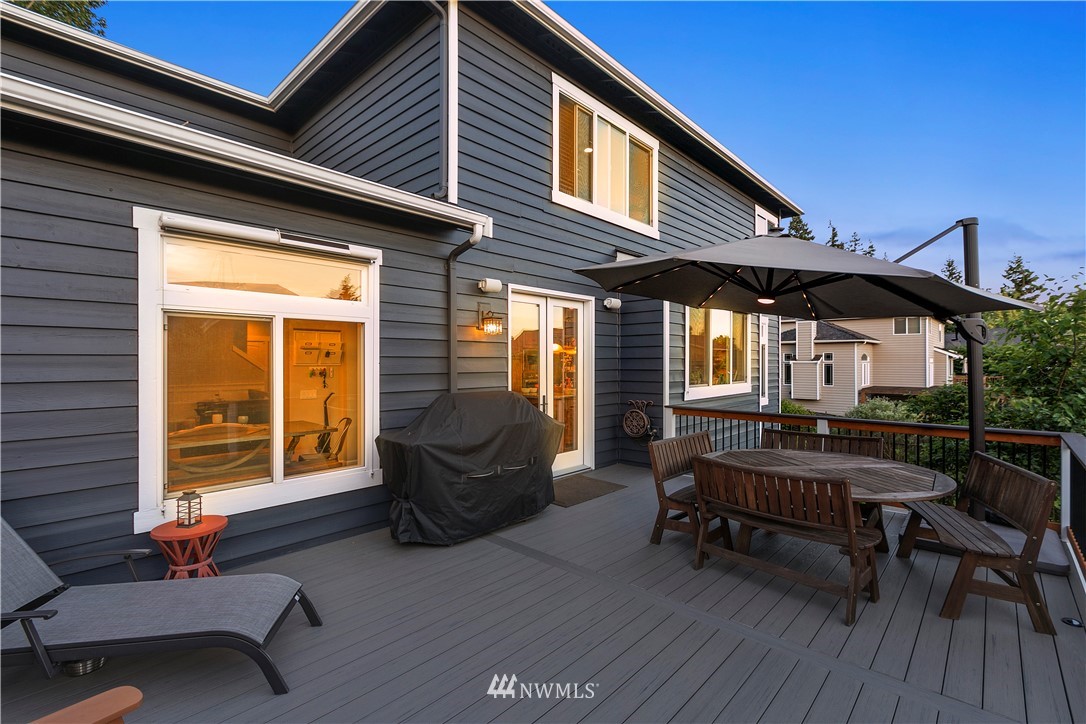 24210 23rd Avenue Southeast Bothell, WA 98021 - Photo 6 of 7 a balcony with furniture and wooden floor
