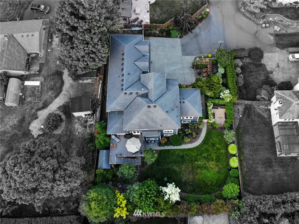 24210 23rd Avenue Southeast Bothell, WA 98021 - Photo 7 of 7 an aerial view of a house with a garden and yard