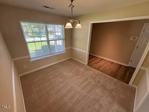 a view of a room with a sink and cabinet