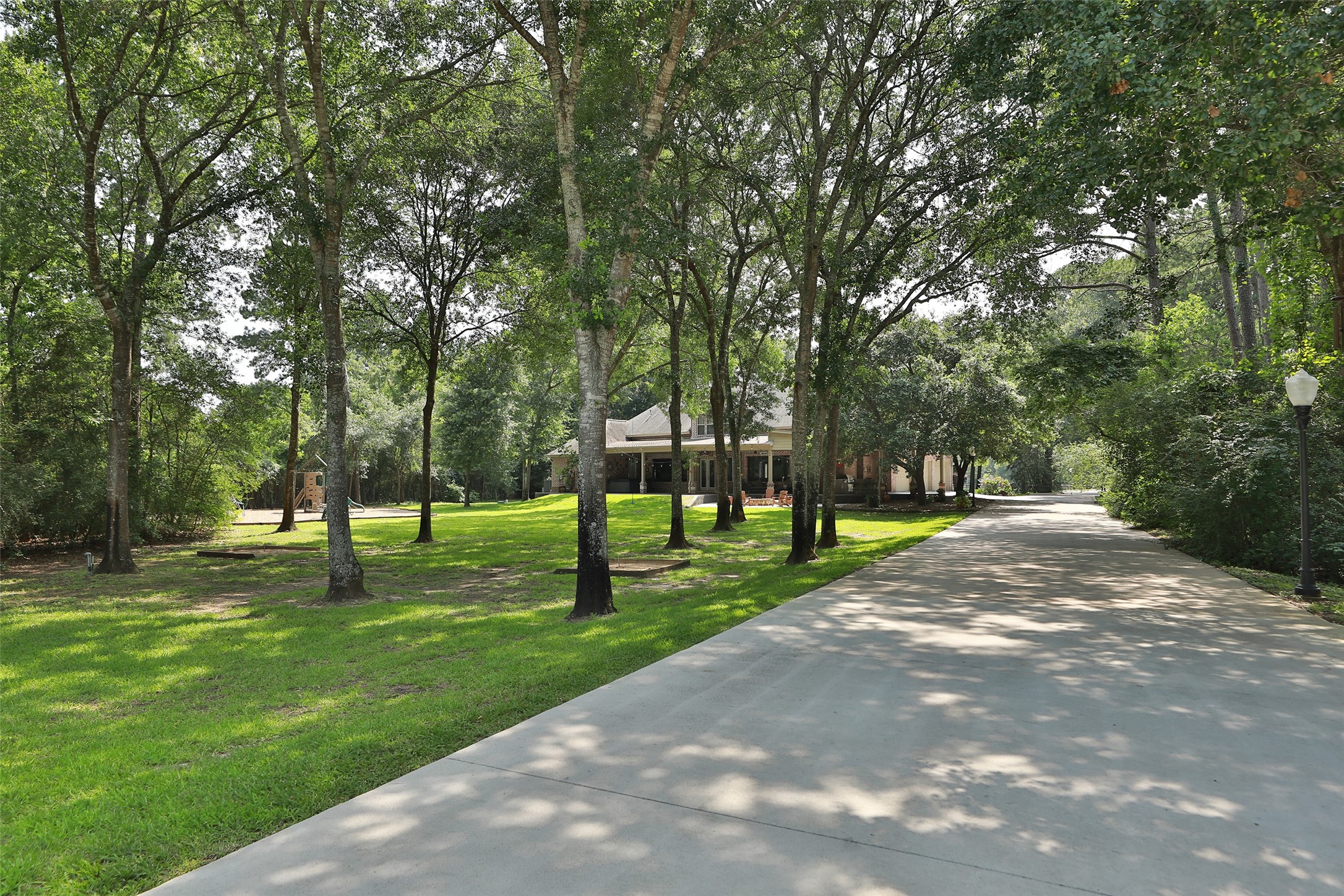 12126 Zion Road Tomball, TX 77375 - Photo 31 of 45 a view of a park with a tree