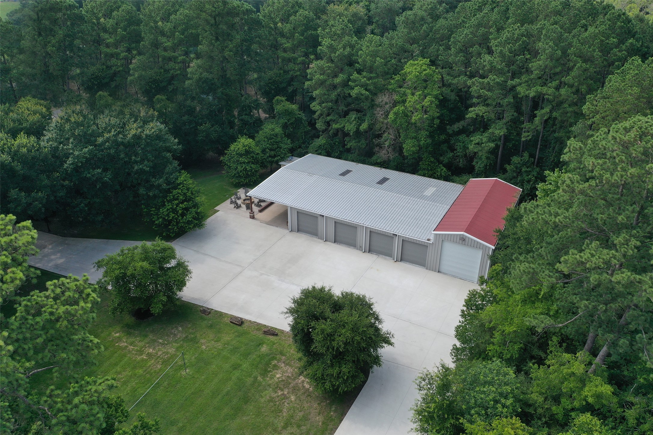 12126 Zion Road Tomball, TX 77375 - Photo 35 of 45 an aerial view of a house with a yard