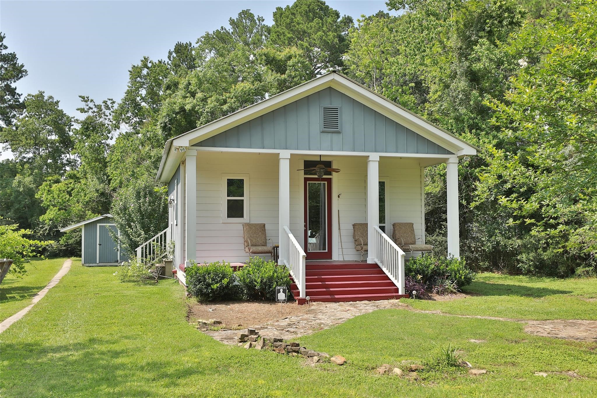 12126 Zion Road Tomball, TX 77375 - Photo 44 of 45 a view of a house with yard and plants
