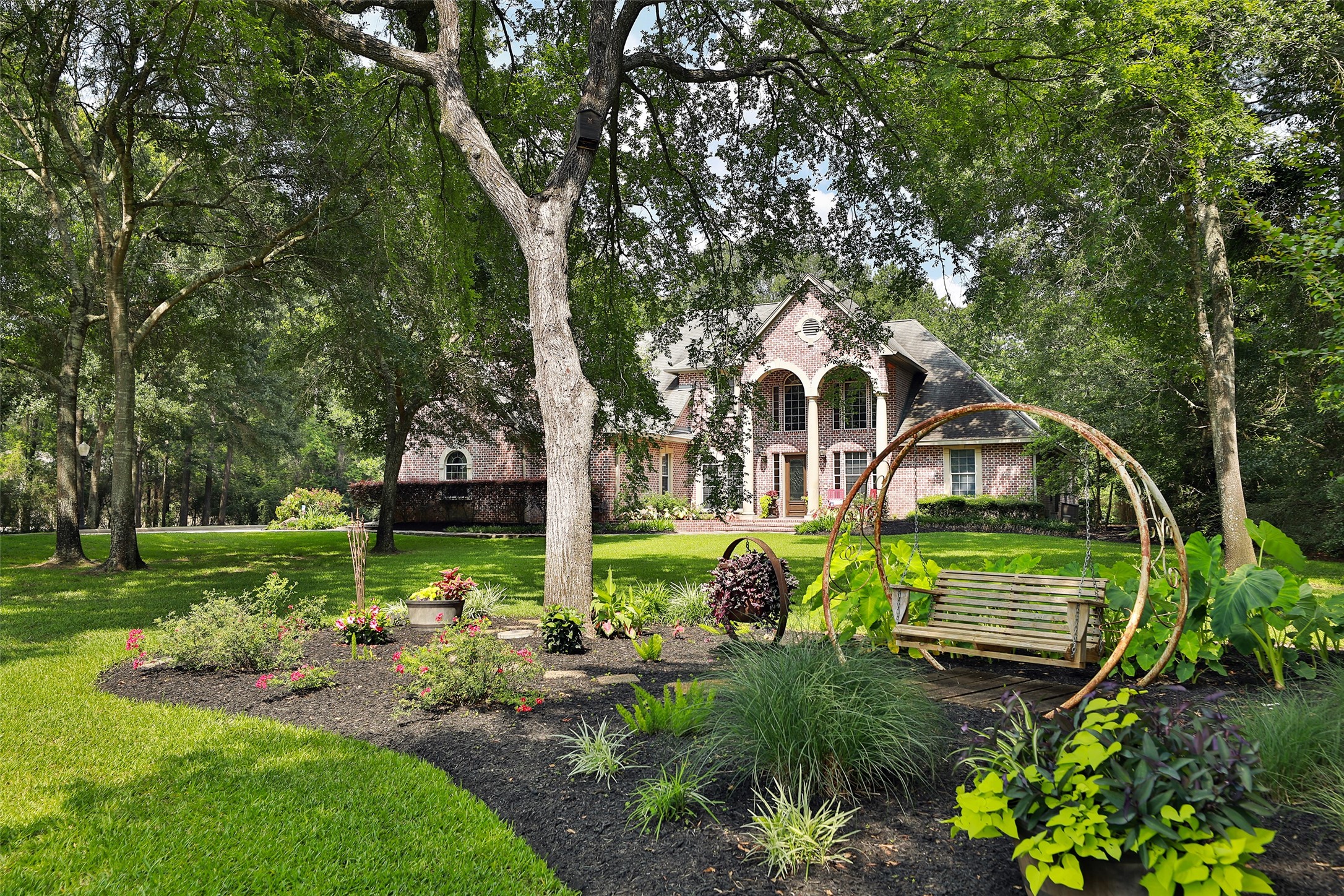 12126 Zion Road Tomball, TX 77375 - Photo 7 of 45 a front view of a house with garden